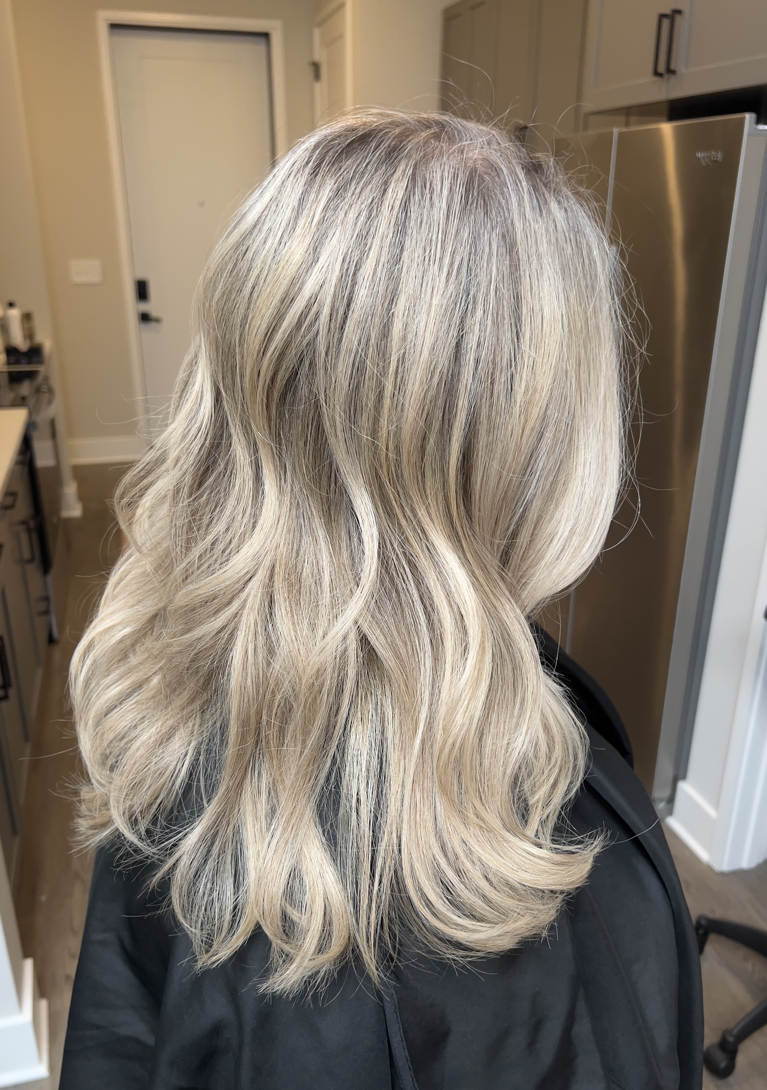 Soft bright blonde waves by Emilee Anderson