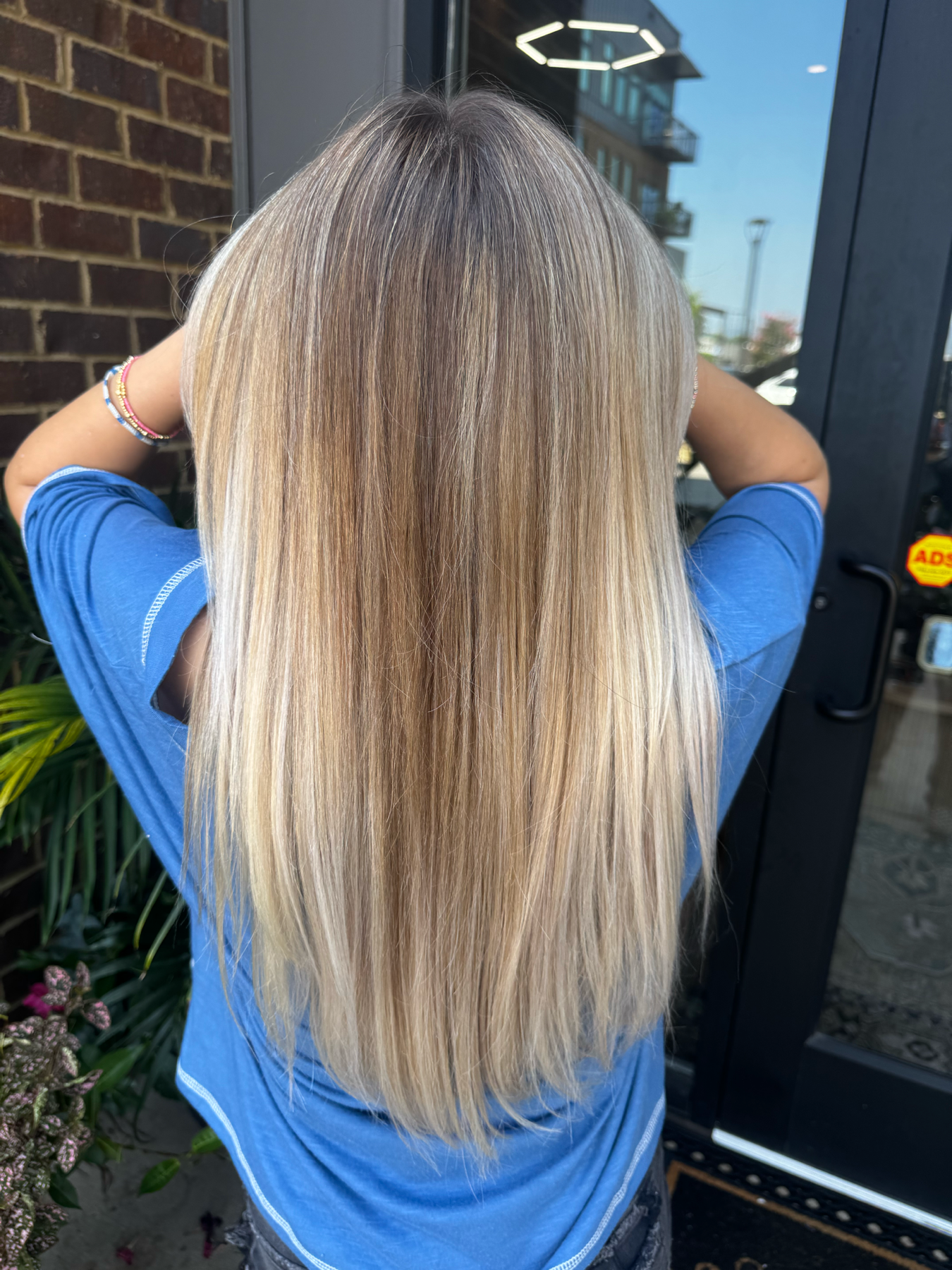 Bright blonde color by Reshae Simmons
