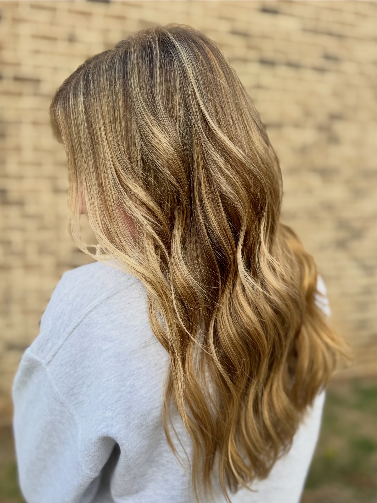 Blonde highlight work by Reshae Simmons