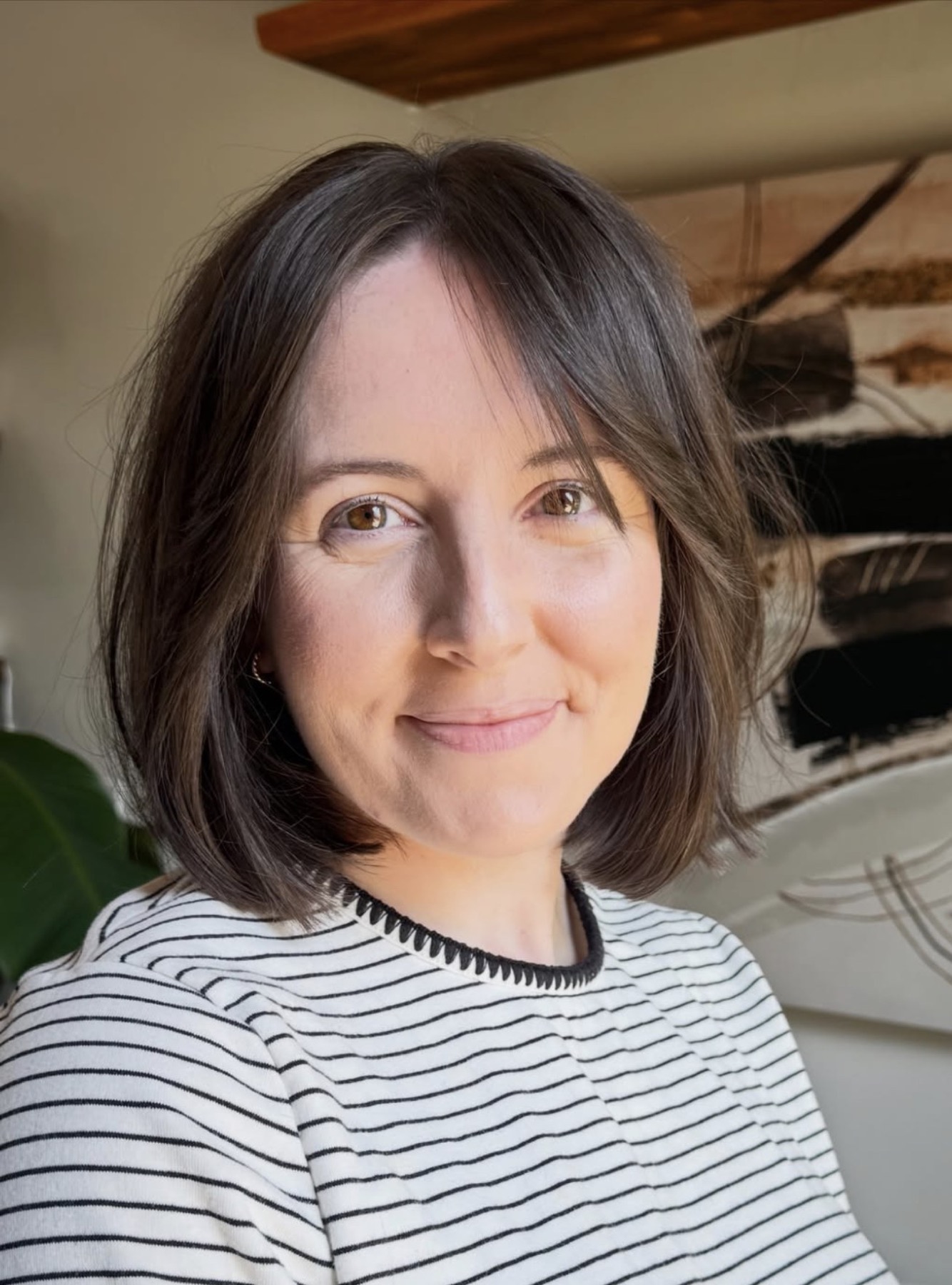 Soft brunette bob haircut by Reshae Simmons